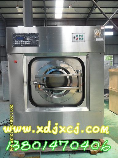 梅州工業(yè)洗衣機與自動熨平機配套使用，<a href=